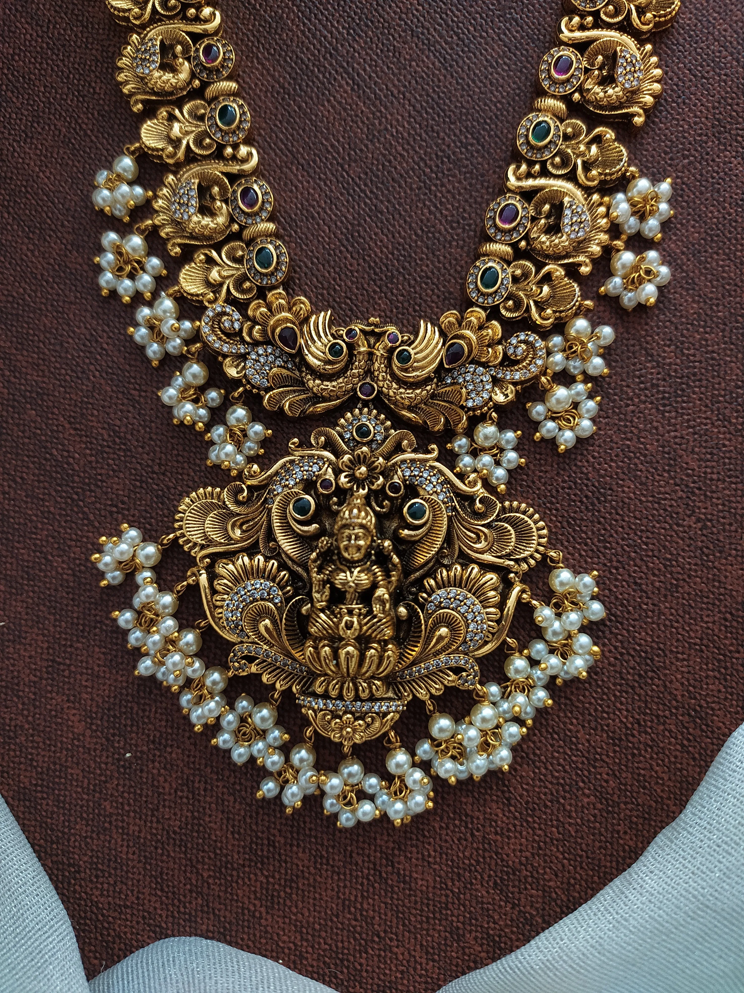 Embrace Divine Grace With Divine Lakshmi Ji Pendant Long Haram Set